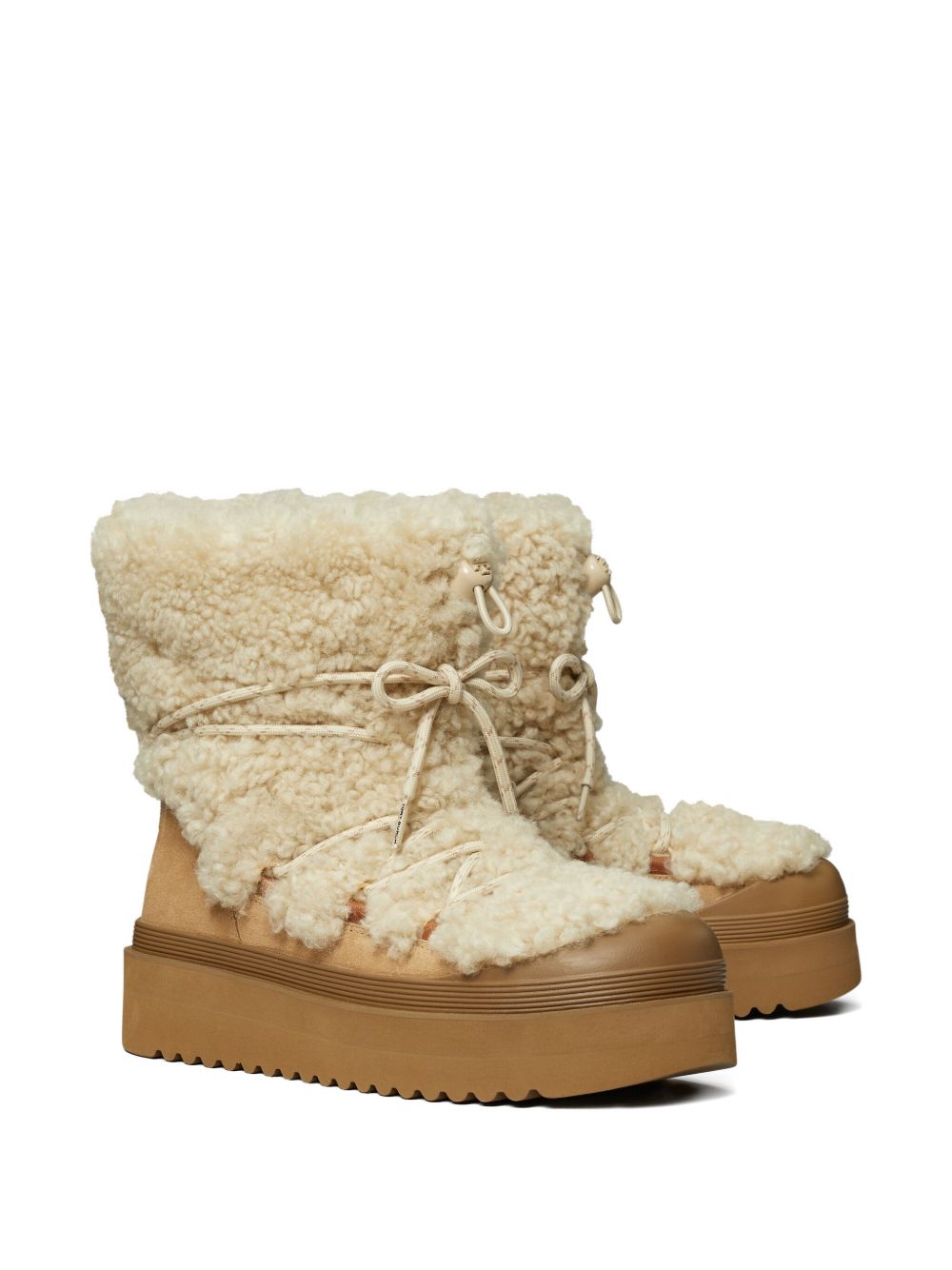 Tory Burch Mellow Shearling Platform Boots.