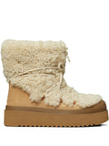 Tory Burch Mellow Shearling Platform Boots.